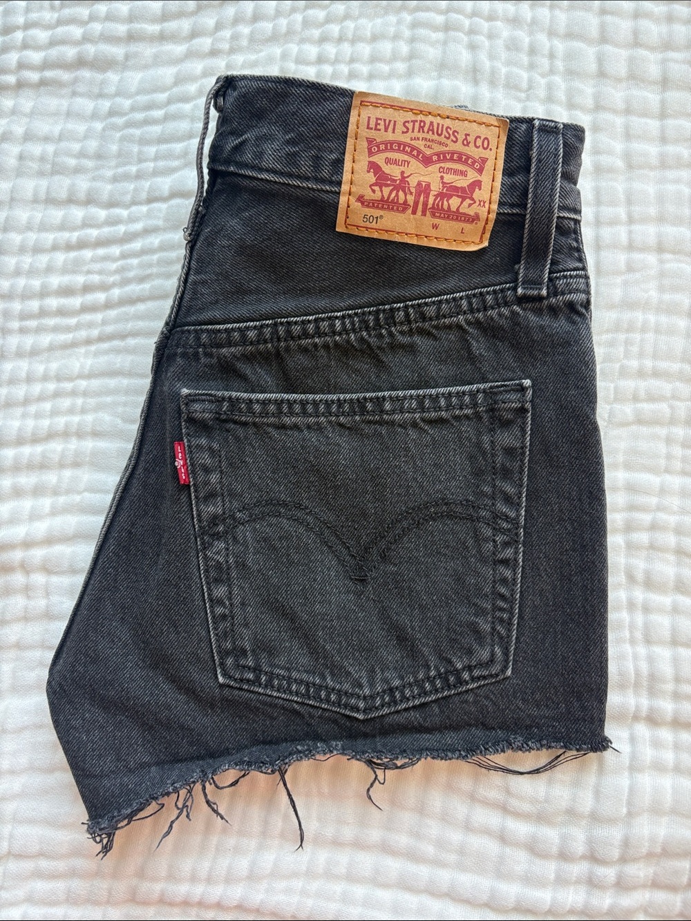 Levi's Original 501 Denim cutoff shorts in Black Wash 24W